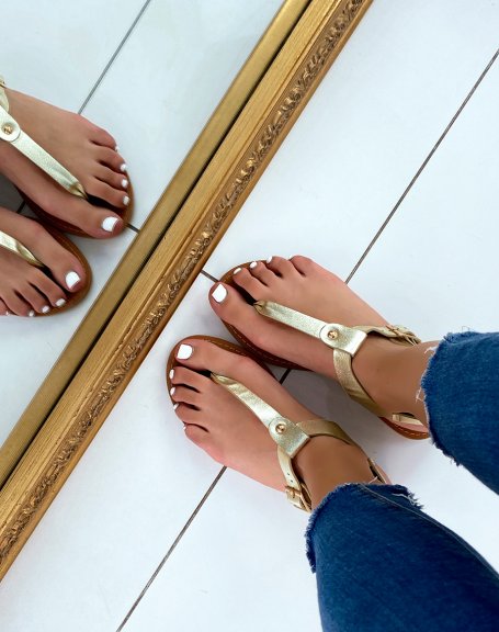 Golden sandals with golden studs