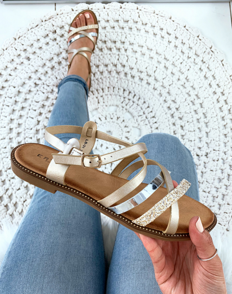 Golden sandals with metallic and braided straps
