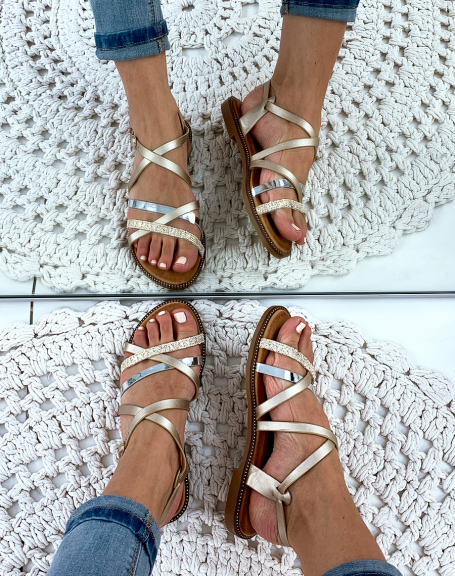 Golden sandals with metallic and braided straps