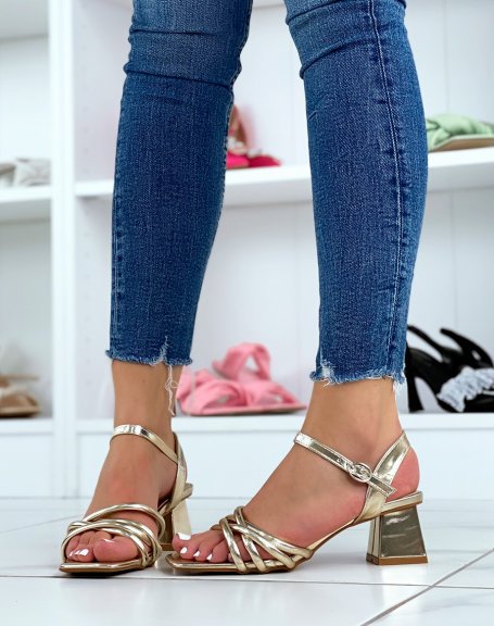 Golden sandals with small heel and multiple straps