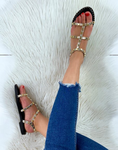 Golden sandals with small studded details