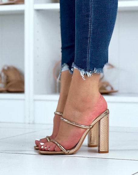Golden sandals with thin double straps with heel