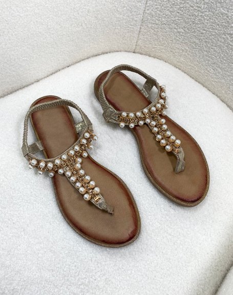 Golden sandals with white pearls and golden rhinestones