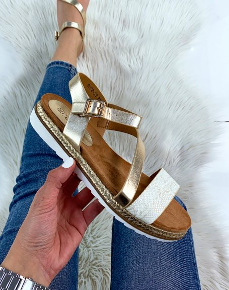 Golden sandals with white snake effect strap
