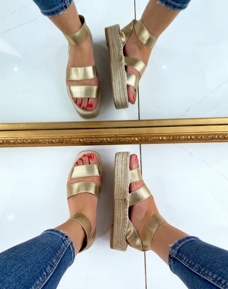 Golden wedge sandals with elastic straps