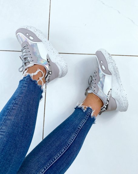 Gray and white sneakers with gold and python inserts