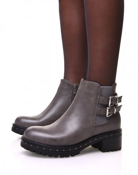 Gray ankle boots with lugged and studded sole