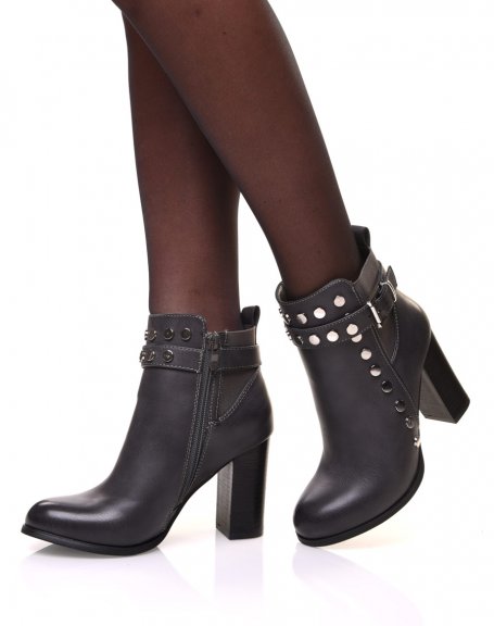 Gray ankle boots with strap, studded details and heels