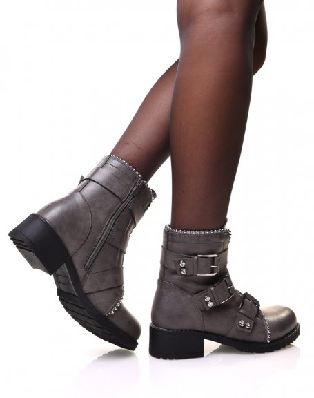 Gray ankle boots with straps and studded details