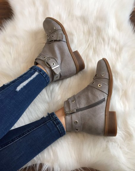 Gray ankle boots with studded straps open at the front