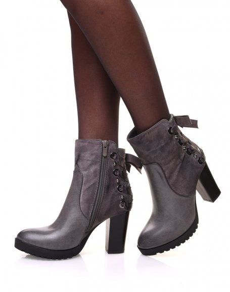 Gray bi-material ankle boots with heels and lace at the back