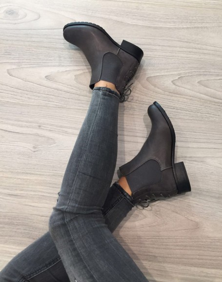 Gray bi-material flat ankle boots with decorative lace at the back