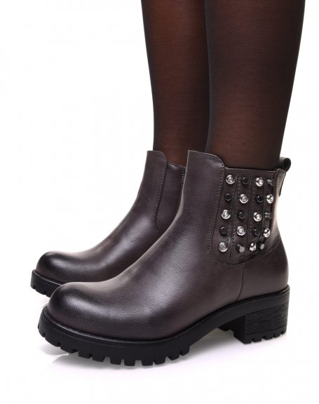 Gray Chelsea boots with studded details