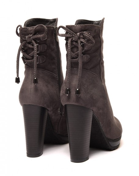 Gray high heeled ankle boots with corset-style lace