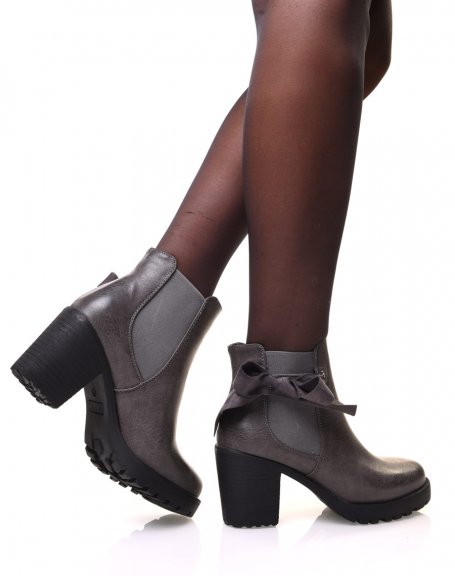 Gray notched ankle boots with bow and eyelets