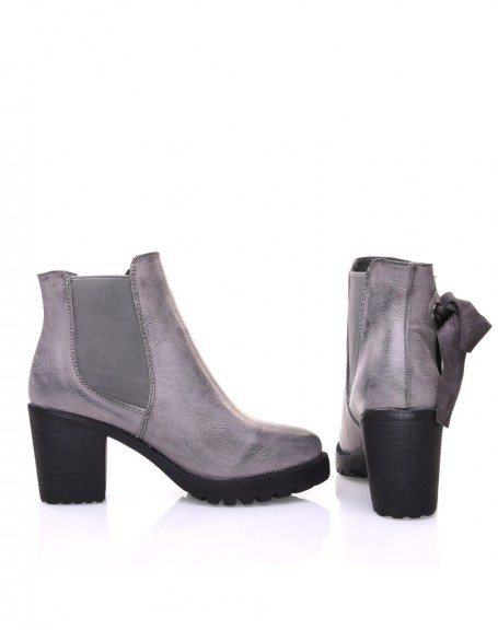 Gray notched ankle boots with knots and eyelets