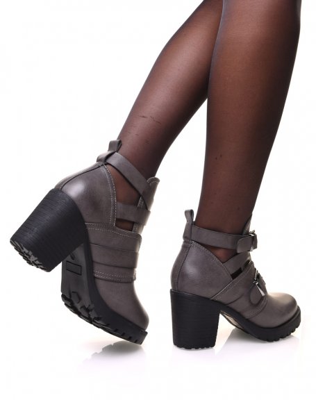 Gray openwork ankle boots with multiple straps and heels