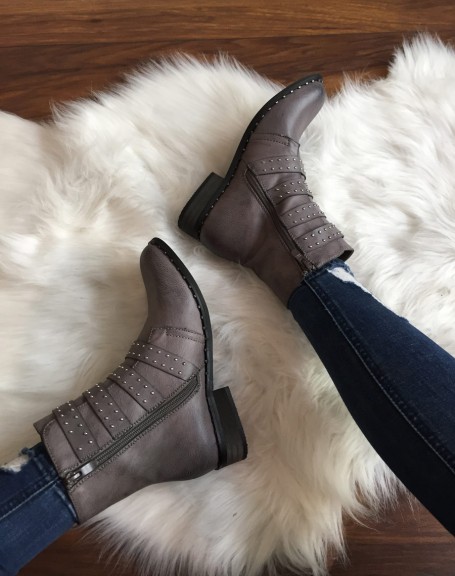 Gray strap ankle boots adorned with studs
