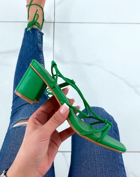 Green sandals with small heel and multiple straps