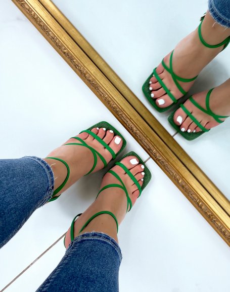 Green sandals with thin strap and burlap interior and stiletto heel