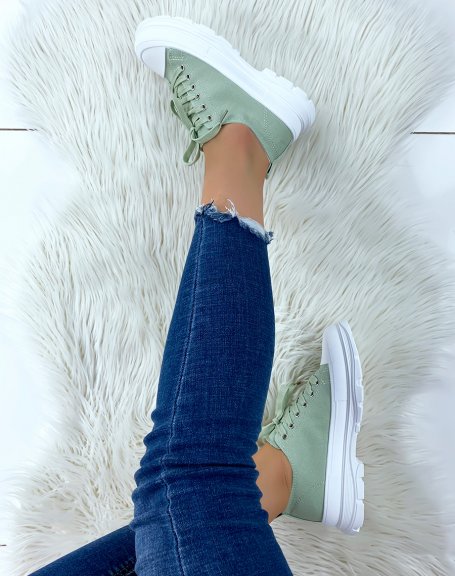 Green sneakers with notched sole