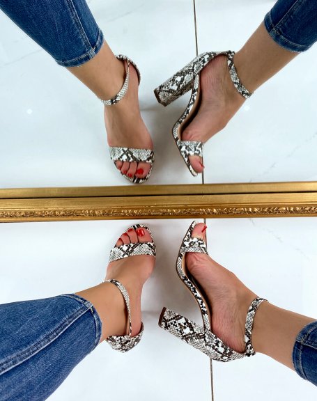 Heeled sandals in python-effect suedette with golden buckle