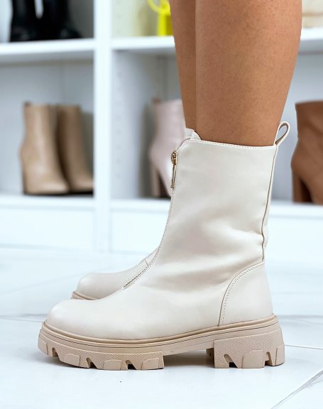 High beige ankle boots with golden closure