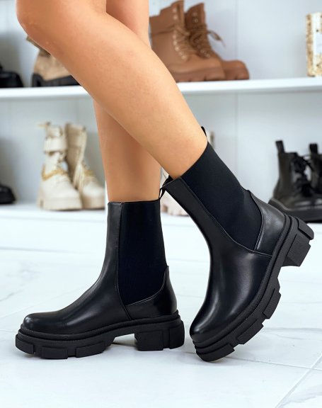 High black ankle boots with elastic and notched sole