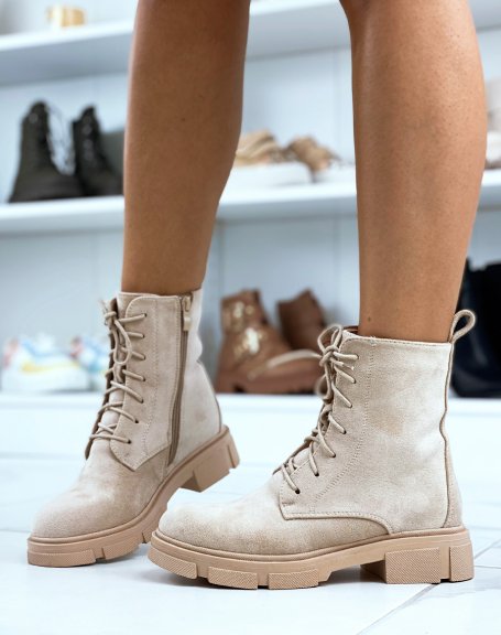 High-top beige suede lace-up ankle boots