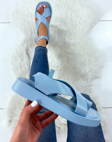Light blue sandals with wide crisscrossing straps