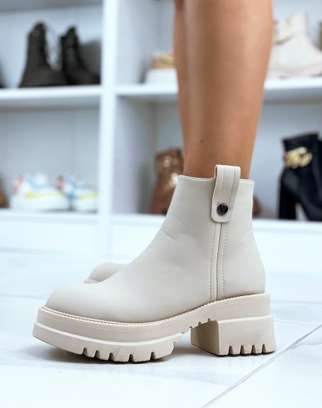 Low and smooth beige ankle boots with chunky heel