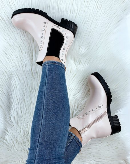 Low beige ankle boots with black elastic