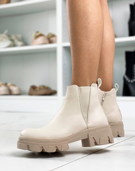 Low beige ankle boots with chunky lug soles