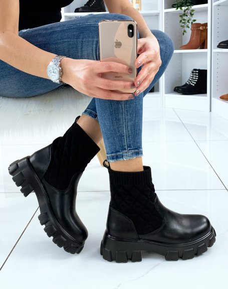 Low black ankle boots with high lug sole