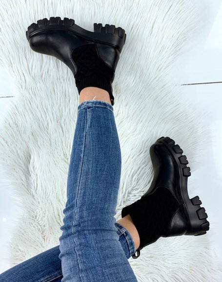 Low black ankle boots with high lug sole