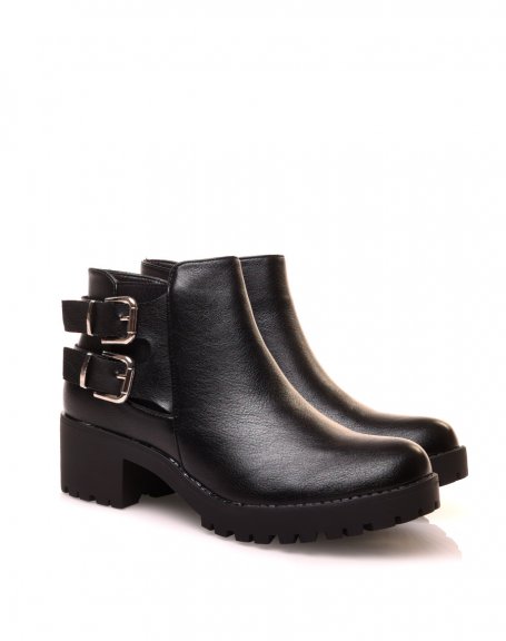 Low black ankle boots with notched soles