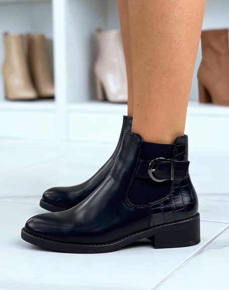 Low black croc-effect ankle boots adorned with a strap