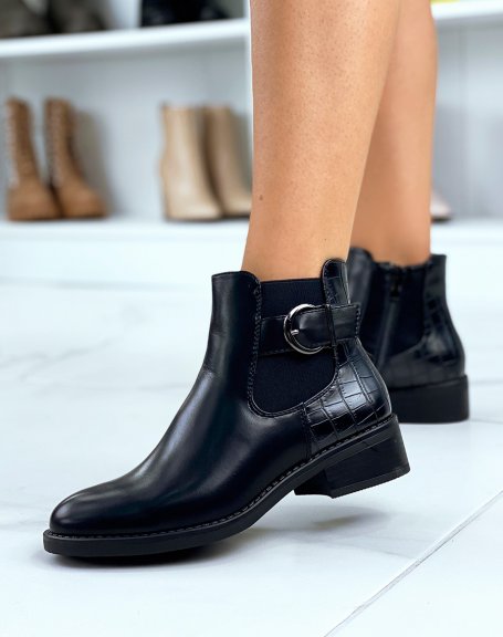 Low black croc-effect ankle boots adorned with a strap