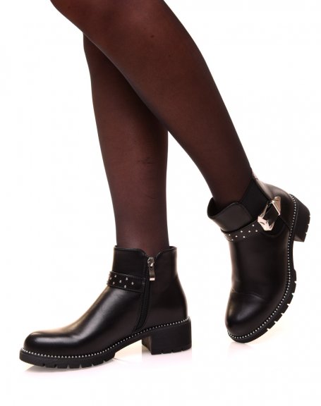 Low black openwork ankle boots with a studded strap