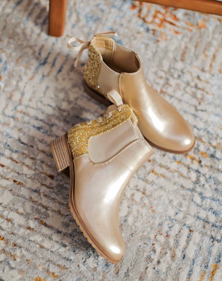 Low gold chelsea boots with sequins and bow