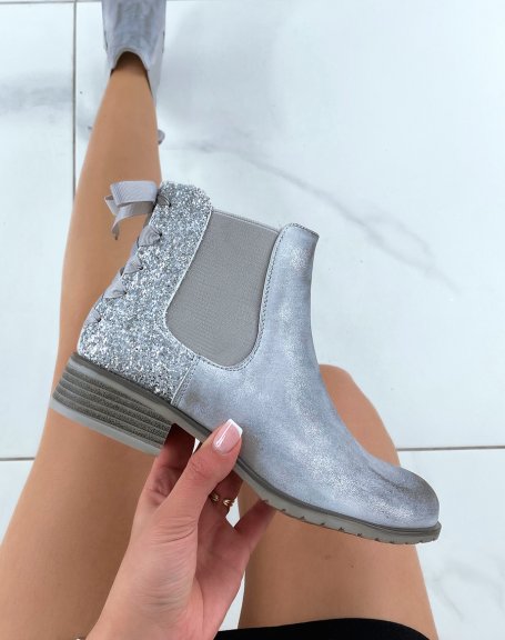 Low silver chelsea boots with sequins and bow