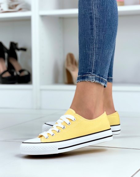 Low sneakers in yellow fabric