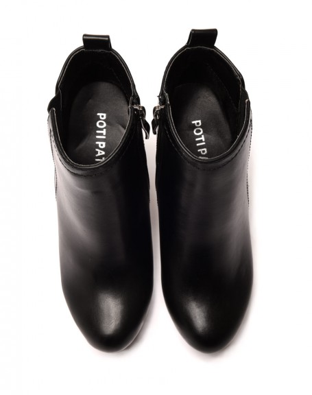 Minimalist black wedge ankle boots