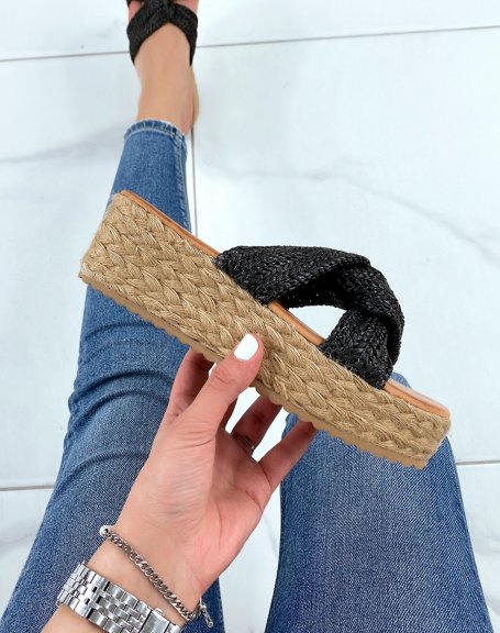Mules with crossover straps in black rope and thick hessian sole