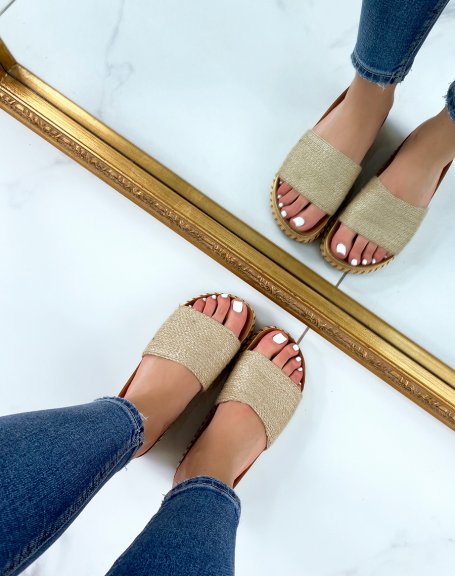 Mules with thick beige strap and thick Aztec style sole