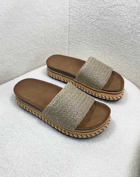 Mules with thick beige strap and thick Aztec style sole