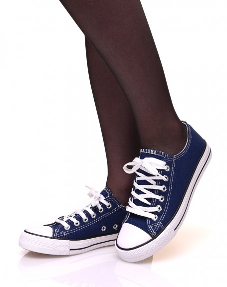 Navy blue canvas sneakers with white laces and black trims