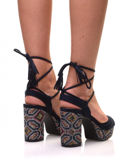 Navy blue sandals with braided heel and platform