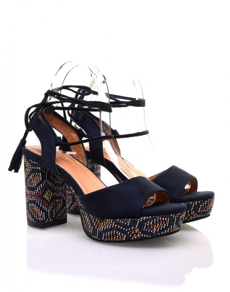 Navy blue sandals with braided heel and platform