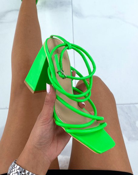 Neon green heeled sandals with multiple straps